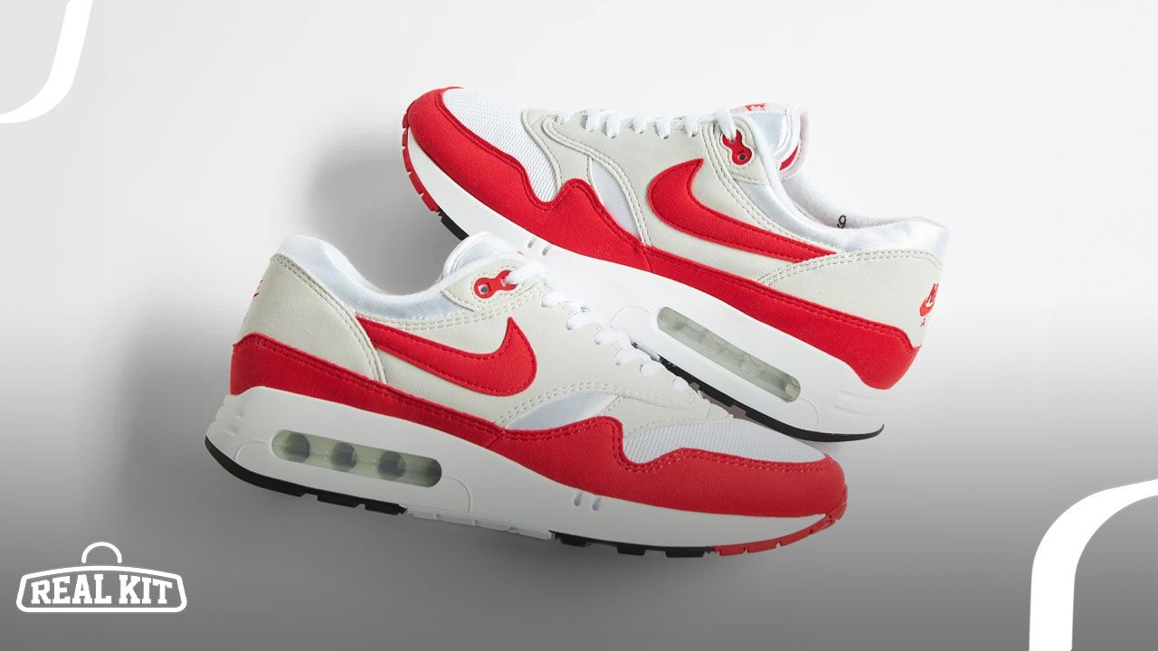 A pair of white, grey, and red "Big Bubble" Air Max sneakers laying on their side on top of each other.